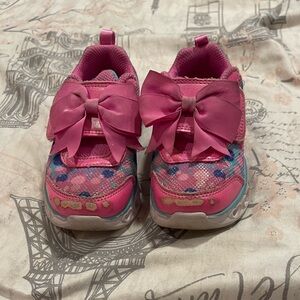 Skechers size 8light up shoes with bow